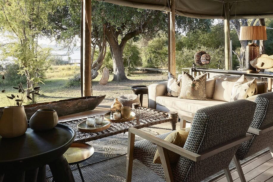 A view from the lounge area at Victoria Falls River Lodge looking out onto the front lawn 