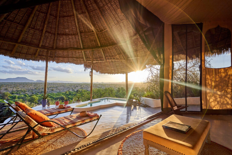 View from the interior of a guest suite at Sasaab with a private plunge pool