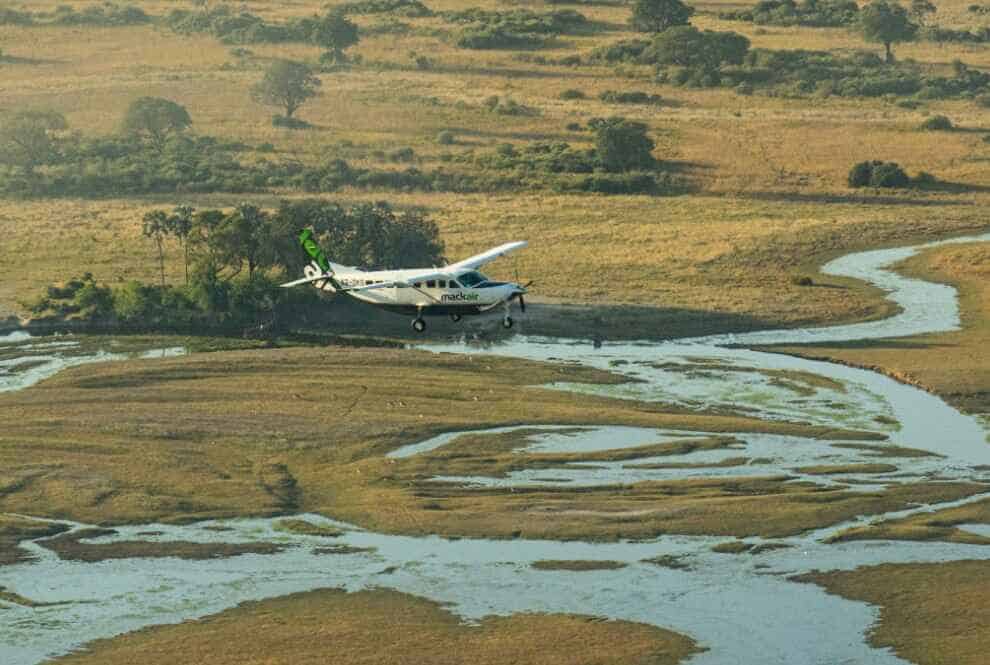 Mack Air flight flying over the Okavango Delta transporting guests to and from their lodge