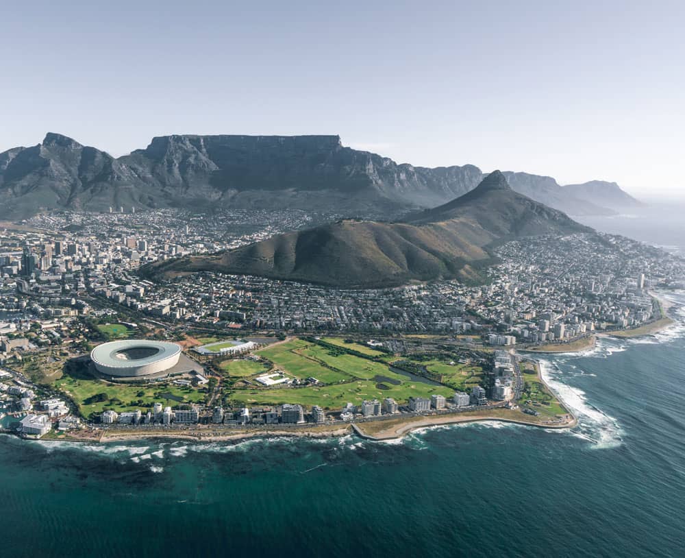 Aerial view of the City of Cape Town showing Table Mountain, the city and the stadium.