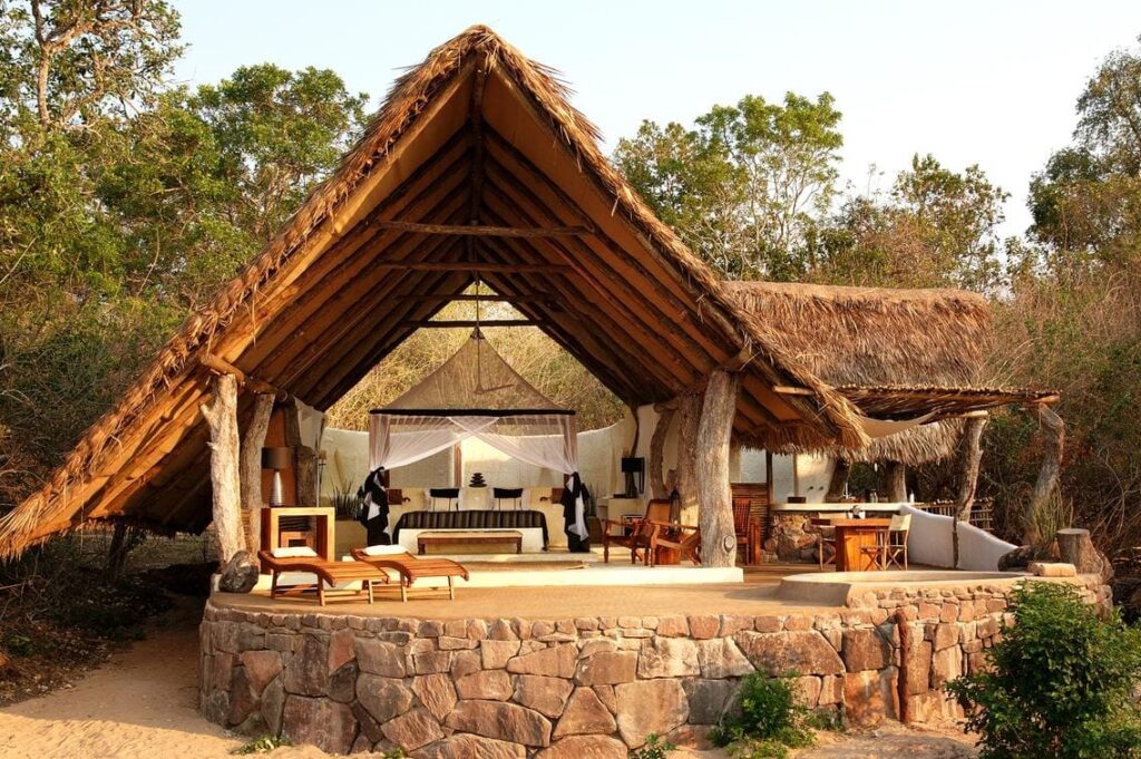 Open-fronted cottage room at Kiba Point with private plunge pool on the right